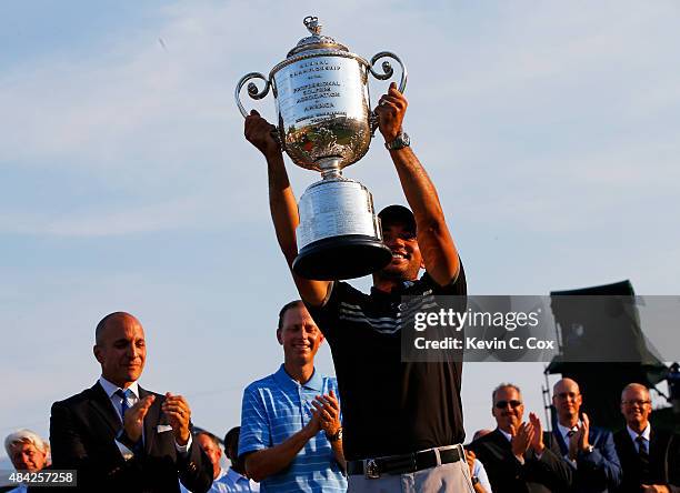 Jason Day of Australia celebrates with the Wanamaker Trophy after winning the 2015 PGA Championship with a score of 20-under par at Whistling Straits...