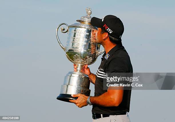 Jason Day of Australia kisses the Wanamaker trophy after winning the 2015 PGA Championship with a score of 20-under par at Whistling Straits on...