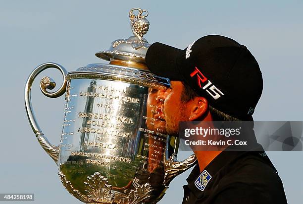 Jason Day of Australia kisses the Wanamaker trophy after winning the 2015 PGA Championship with a score of 20-under par at Whistling Straits on...