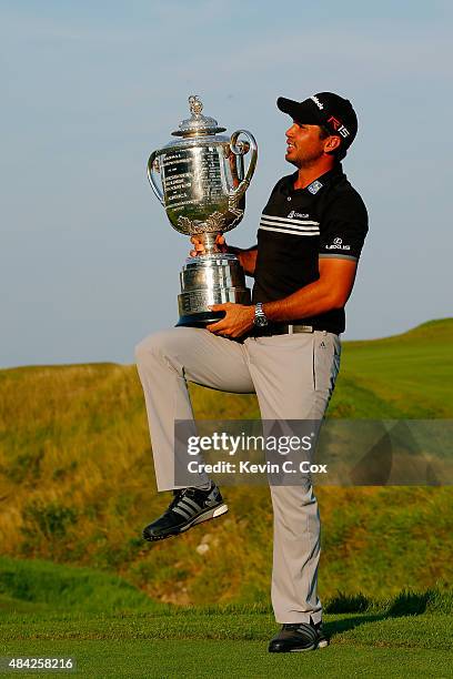 Jason Day of Australia poses with the Wanamaker trophy after winning the 2015 PGA Championship with a score of 20-under par at Whistling Straits on...