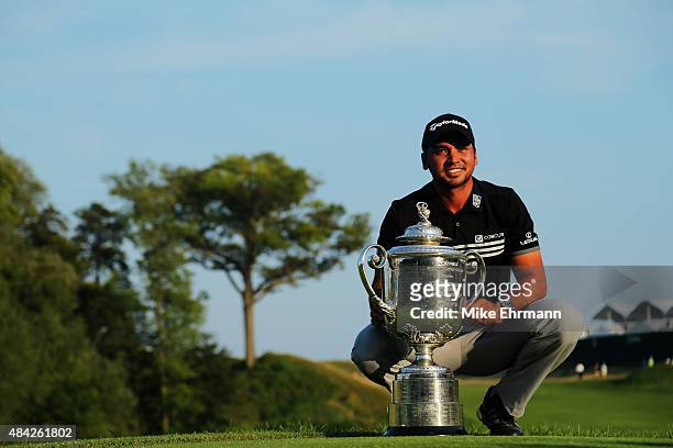Jason Day of Australia poses with the Wanamaker trophy after winning the 2015 PGA Championship with a score of 20-under par at Whistling Straits on...