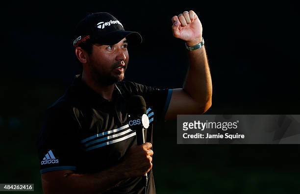 Jason Day of Australia waits on the 18th green after winning the 2015 PGA Championship with a score of 20-under par at Whistling Straits on August...