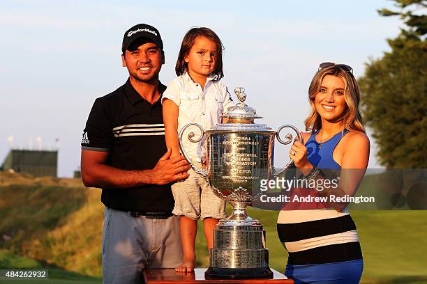 Jason Day of Australia poses with the Wanamaker Trophy and his wife Ellie and son Dash after winning the 2015 PGA Championship with a score of...