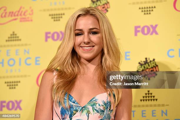 Actress Chloe Lukasiak, winner of the Choice Dancer Award, poses in the press room during the Teen Choice Awards 2015 at the USC Galen Center on...