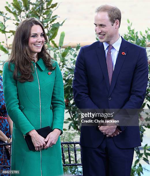 Prince William, Duke of Cambridge and Catherine, Duchess of Cambridge laugh on stage during a visit to the Avanti Drome on April 12, 2014 in...