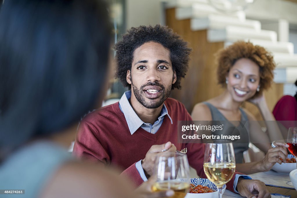 Friends celebrating at a dinner party