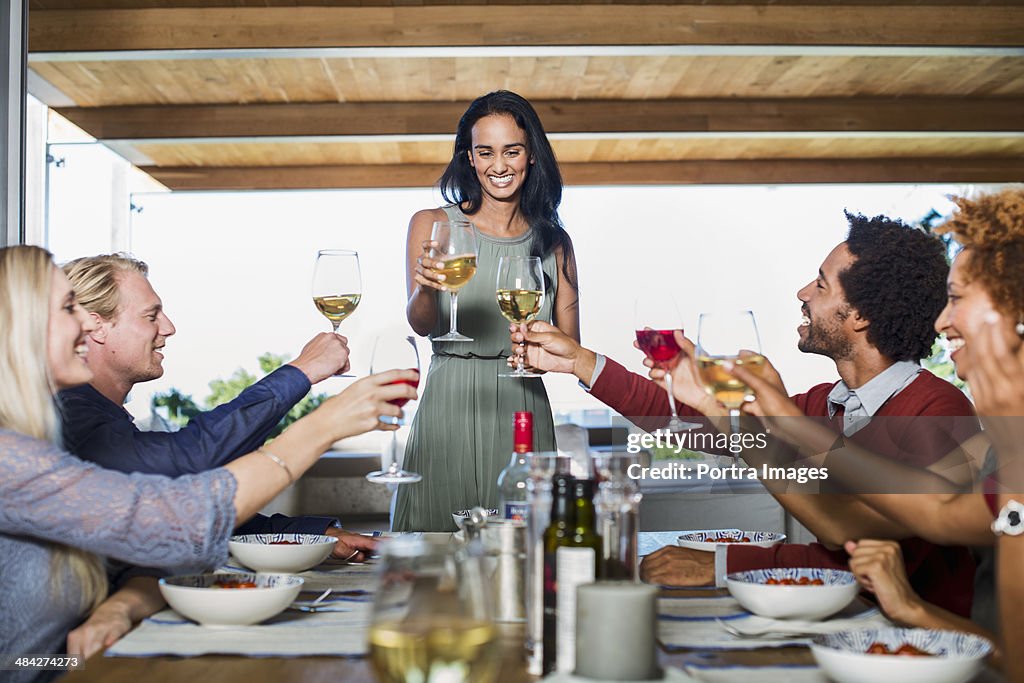 Woman hosting a dinner party