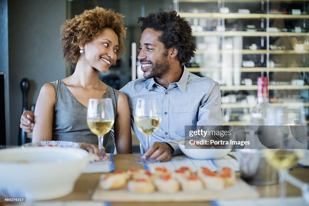 Romantic couple at a dinner party