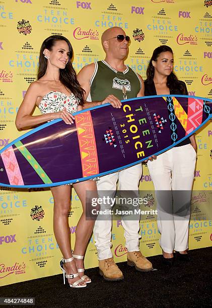 Actors Jordana Brewster, Vin Diesel and Michelle Rodriguez, winners of the Choice Movie: Action Award for Furious 7, pose in the press room during...