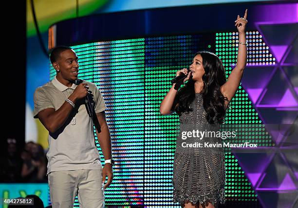 Co-hosts Ludacris and Gina Rodriguez speak onstage during the Teen Choice Awards 2015 at the USC Galen Center on August 16, 2015 in Los Angeles,...