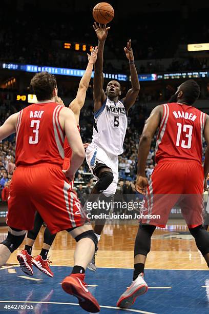 April 11: Gorgui Dieng of the Minnesota Timberwolves shoots the game winning shot during the game against the Houston Rockets on April 11, 2014 at...