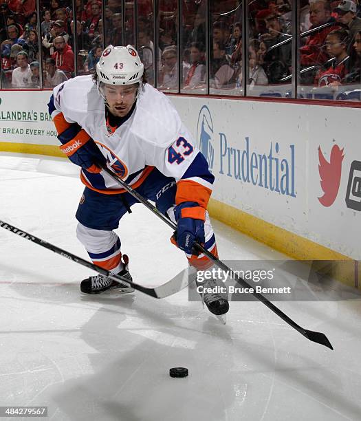 Mike Halmo of the New York Islanders skates against the New Jersey Devils at the Prudential Center on April 11, 2014 in Newark, New Jersey. The...