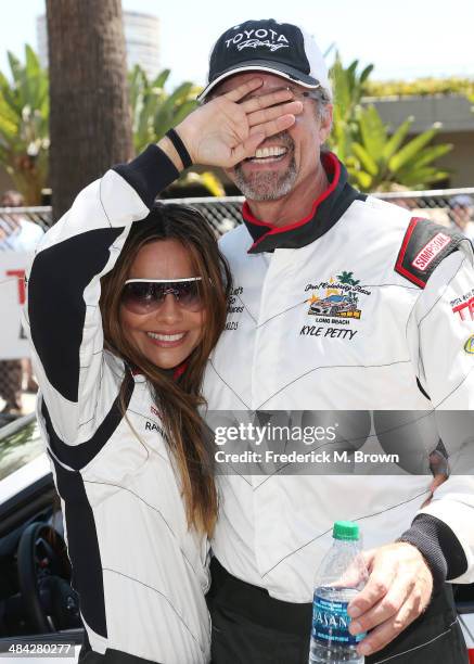 Actress Vanessa Marcil and race car driver Kyle Petty attend the qualifying segment of the 37th Annual Toyota Pro/Celebrity Race on April 11, 2014 in...