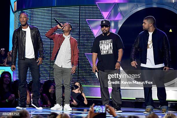 Actors Corey Hawkins, Jason Mitchell, actor/recording artist Ice Cube and actor O'Shea Jackson Jr. Speak onstage during the Teen Choice Awards 2015...