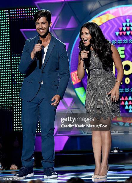 Co-hosts Josh Peck and Gina Rodriguez speak onstage during the Teen Choice Awards 2015 at the USC Galen Center on August 16, 2015 in Los Angeles,...