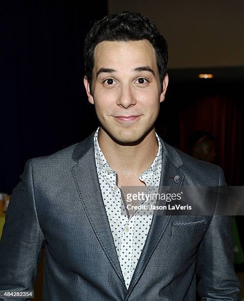 Actor Skylar Astin poses in the green room at the 2015 Teen Choice Awards at Galen Center on August 16, 2015 in Los Angeles, California.