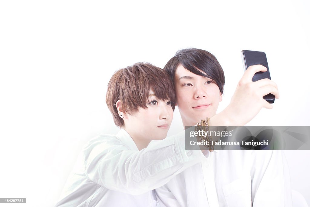 Young couple taking photo