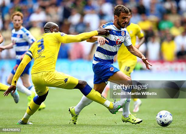 Souleymane Bamba of Leeds United tackles Orlando Sa of Reading during the Sky Bet Championship match between Reading and Leeds United at Madejski...