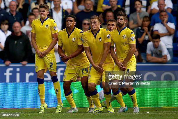 Sam Byram, Tom Adeyemi, Chris Wood and Luke Murphy of Leeds United form defensive wall to defend a freekick during the Sky Bet Championship match...