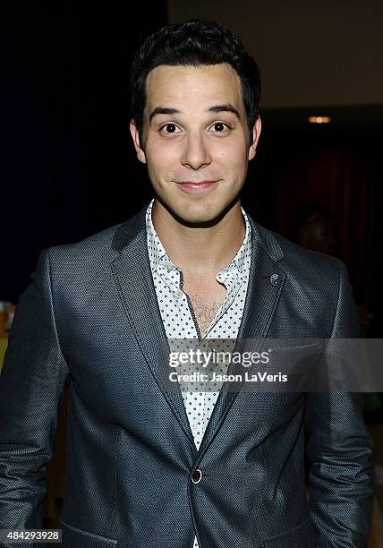 Actor Skylar Astin poses in the green room at the 2015 Teen Choice Awards at Galen Center on August 16, 2015 in Los Angeles, California.