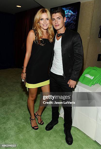 Actress Bella Thorne and actor Gregg Sulkin pose in the green room at the 2015 Teen Choice Awards at Galen Center on August 16, 2015 in Los Angeles,...