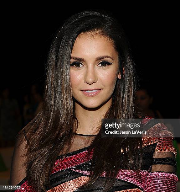 Actress Nina Dobrev poses in the green room at the 2015 Teen Choice Awards at Galen Center on August 16, 2015 in Los Angeles, California.