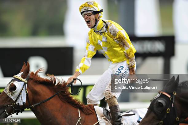 Hugh Bowman riding Criterion celebrates on the finishing line to win Race 6, the BMW Australian Derby during day one of The Championships at Royal...