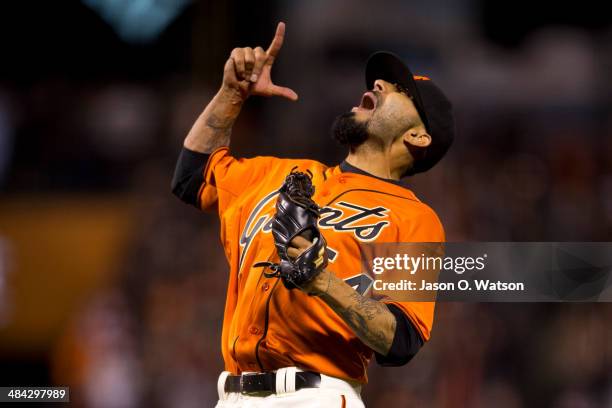 Sergio Romo of the San Francisco Giants celebrates after the game against the Colorado Rockies at AT&T Park on April 11, 2014 in San Francisco,...