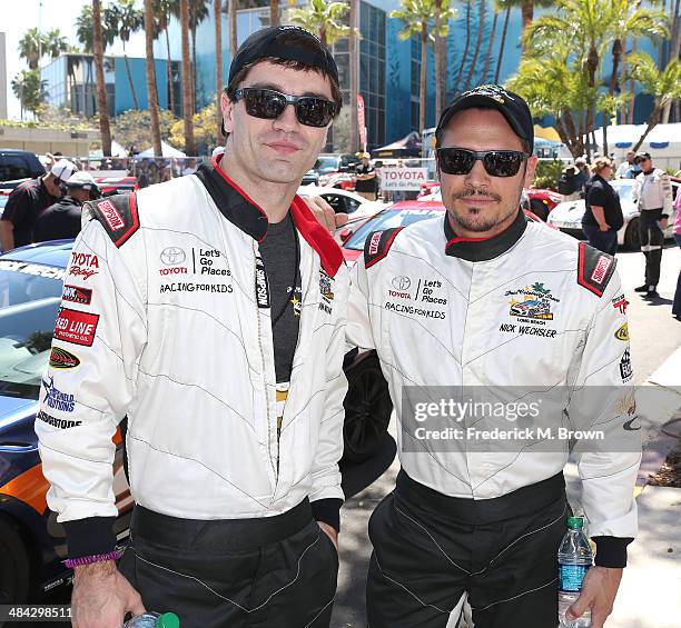 Actors Sam Witwer and Nick Wechsler attend the qualifying segment of the 37th Annual Toyota Pro/Celebrity Race on April 11, 2014 in Long Beach,...