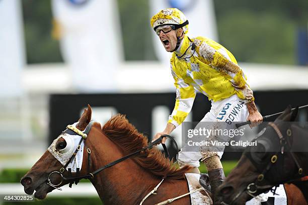 Hugh Bowman riding Criterion celebrates on the finishing line to win Race 6, the BMW Australian Derby during day one of The Championships at Royal...