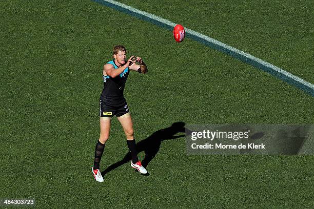 Matthew Lobbe of the Power receives the ball during the round 4 AFL game between Port Adelaide and the Brisbane Lions at Adelaide Oval on April 12,...