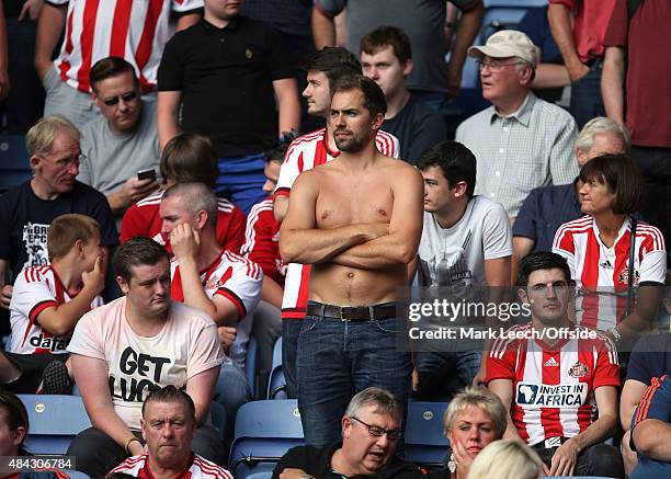 Sunderland fans look dejected with their team 3-0 down at half time during the Barclays Premier League match between Leicester City and Sunderland at...