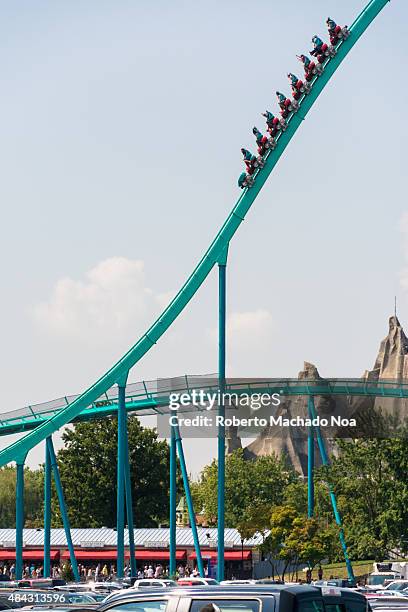 Canada's Wonderland Leviathan Roller Coaster.Rollercoaster in amusement park in summer. Moving roller coaster with blue sky.