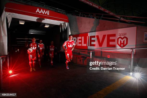 Harry Kewell leads his team out for the warm up in his last professinal football match during the round 27 A-League match between Melbourne Heart and...