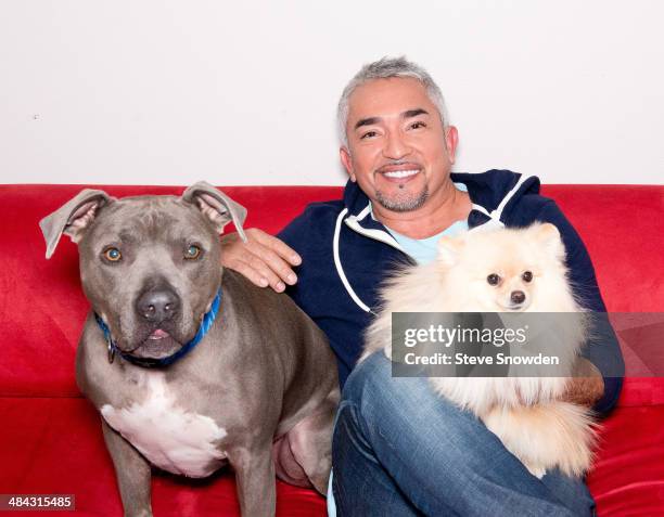 Dog Whisperer Cesar Millan, star of Nat Geo WILDs series Leader of the Pack, poses backstage with his pit bull Junior after his performance at Route...