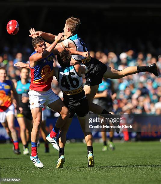 Hamish Hartlett of the Power attempts a high flying mark during the round 4 AFL game between Port Adelaide and the Brisbane Lions at Adelaide Oval on...
