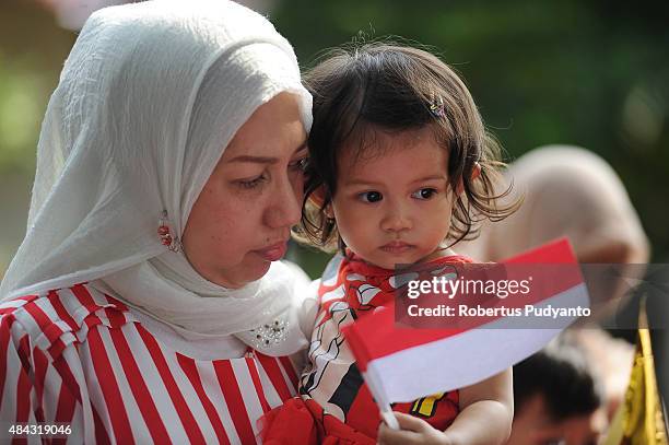 Indonesian kids take part in the 70th Indonesia National Independence day celebration on August 17, 2015 in Jakarta, Indonesia. Indonesia became an...