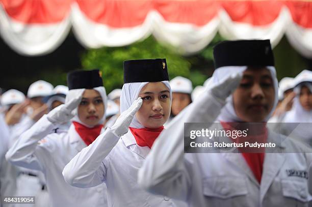 Indonesian students take part in the 70th Indonesia National Independence day ceremony on August 17, 2015 in Jakarta, Indonesia. Indonesia became an...