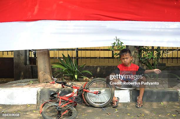 Indonesian kids take part in the 70th Indonesia National Independence day celebration on August 17, 2015 in Jakarta, Indonesia. Indonesia became an...