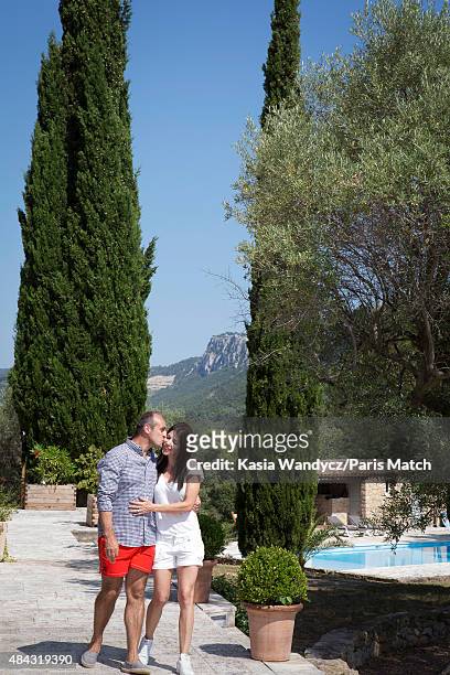 Former player and rugby coach Philippe Saint-Andre is photographed with his wife Patricia at their home for Paris Match on June 17, 2015 near Toulon,...