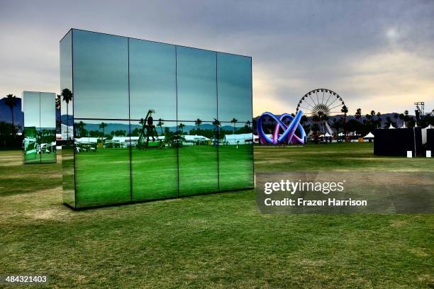 Reflection Field art installation by Phillip K. Smith, Lightweaver art installation by Alexis Rochas and the Ferris wheel are seen during day 1 of...