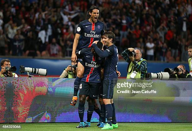 Blaise Matuidi of PSG celebrates scoring a goal with Edinson Cavani and Maxwell Scherrer of PSG during the French Ligue 1 match between Paris...