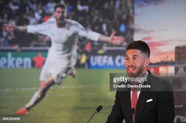 Sergio Ramos of Real Madrid smiles during a press conference to announce his new five-year contract with Real Madrid at the Santiago Bernabeu stadium...