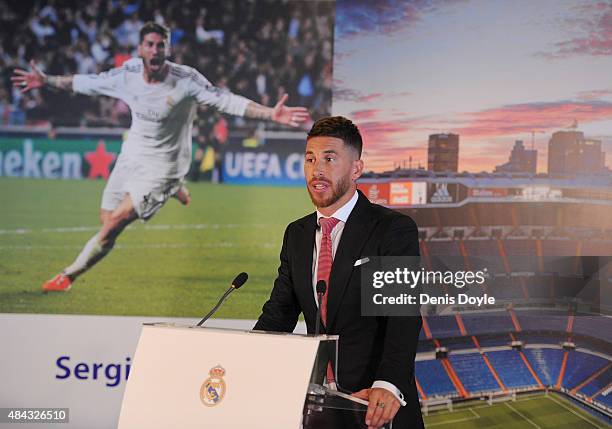 Sergio Ramos of Real Madrid smiles during a press conference to announce his new five-year contract with Real Madrid at the Santiago Bernabeu stadium...