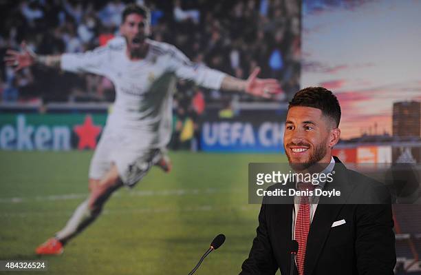 Sergio Ramos of Real Madrid smiles during a press conference to announce his new five-year contract with Real Madrid at the Santiago Bernabeu stadium...