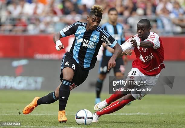 Mario Lemina of OM and Prince Oniangue of Stade de Reims in action during the French Ligue 1 match between Stade de Reims and Olympique de Marseille...