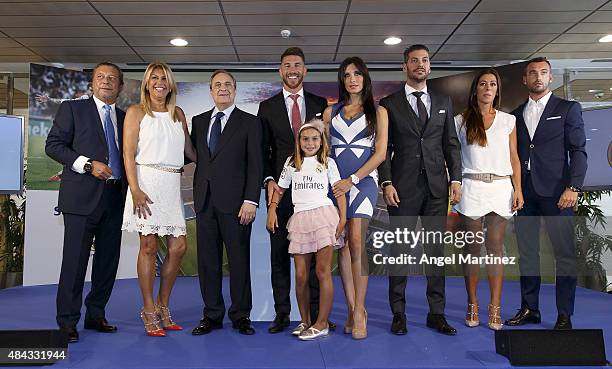 Sergio Ramos of Real Madrid poses with his family and Real president Florentino Perez during a press conference to announce Ramos' new five-year...