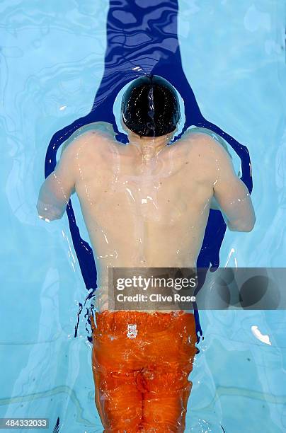 Roberto Pavoni competes in the Men's 200m Butterfly heats on day three of the British Gas Swimming Championships 2014 at Tollcross International...