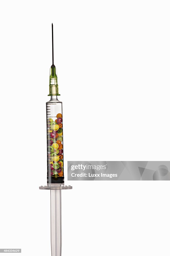 Syringe filled with fruit