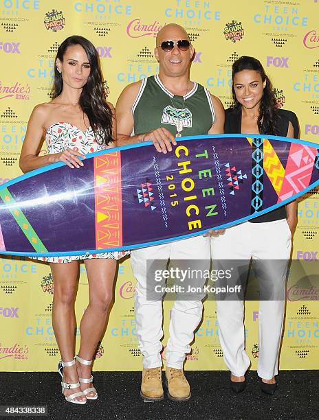 Actors Jordana Brewster, Vin Diesel and Michelle Rodriguez pose in the press room at the Teen Choice Awards 2015 at Galen Center on August 16, 2015...